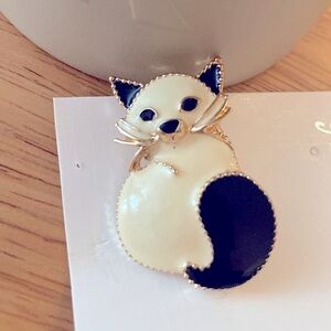 Cat Brooch. Black and white enamel brooch